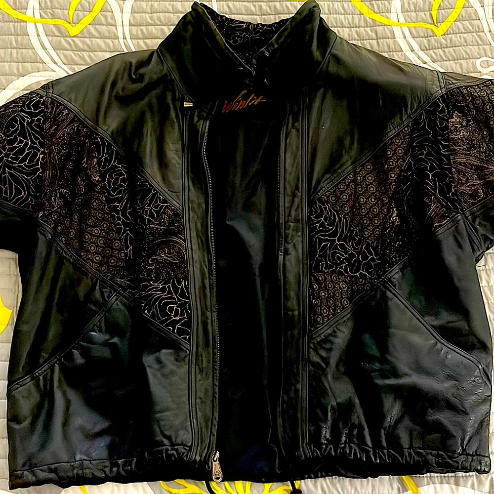 Winlit black leather jacket with beautiful pattern.